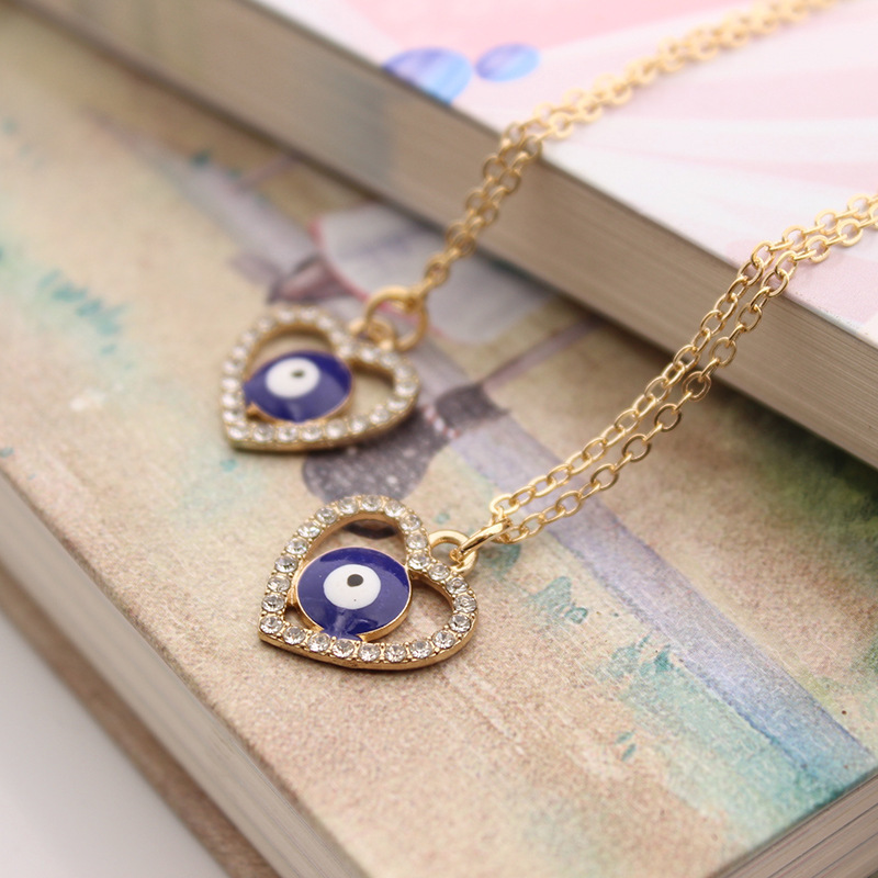 Fashion alloy gold plated chain blue eyes diamond necklace jewelry long inlaid heart evil eyes necklace for women