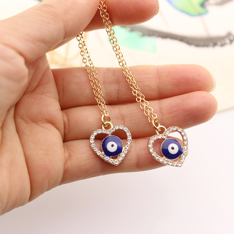 Fashion alloy gold plated chain blue eyes diamond necklace jewelry long inlaid heart evil eyes necklace for women