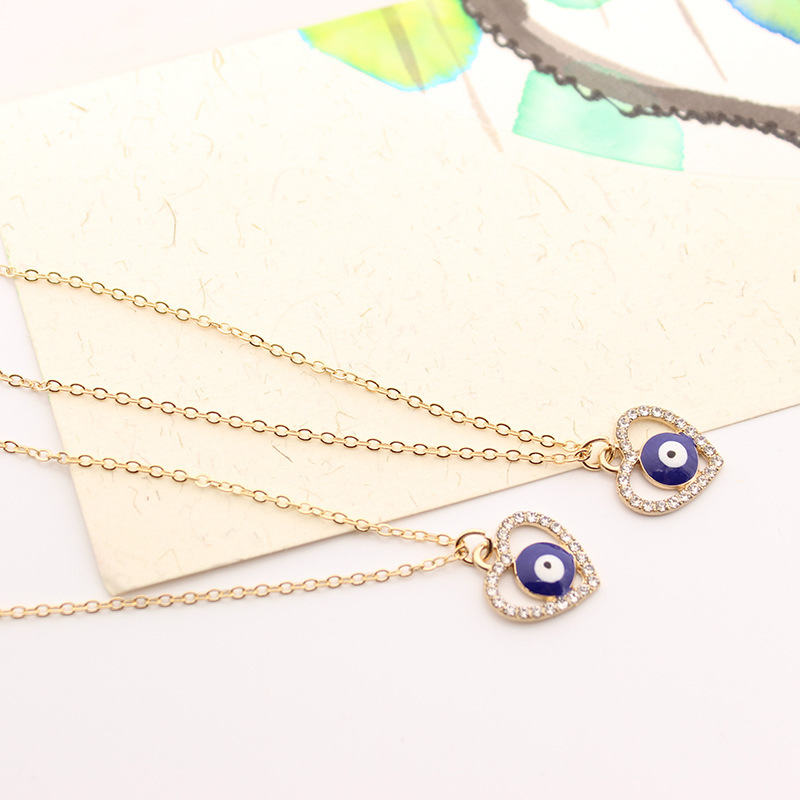 Fashion alloy gold plated chain blue eyes diamond necklace jewelry long inlaid heart evil eyes necklace for women