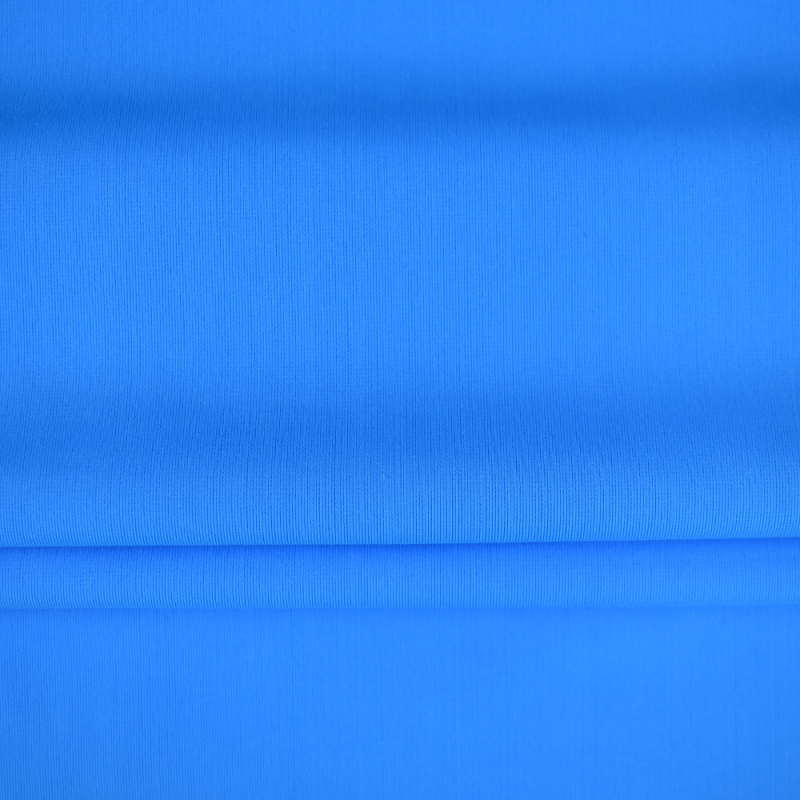 Stock High Elastic Flame retardant UPF40+ Solid dyed swimwear nylon warp spandex knitted fabric for T-shirt