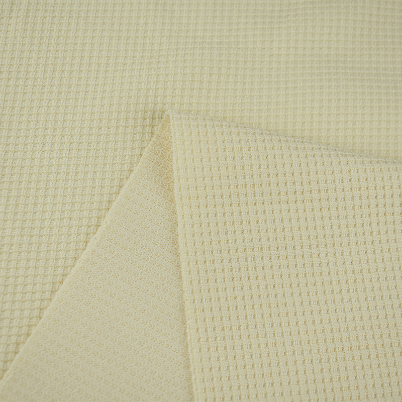 Textile manufacturers 40S Anti pilling solid colors 100% polyester cotton like waffle fabric for home wear