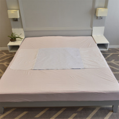 Almohadillas de cama para incontinencia de absorbencia reutilizables al por mayor personalizadas lavables con lado plegable