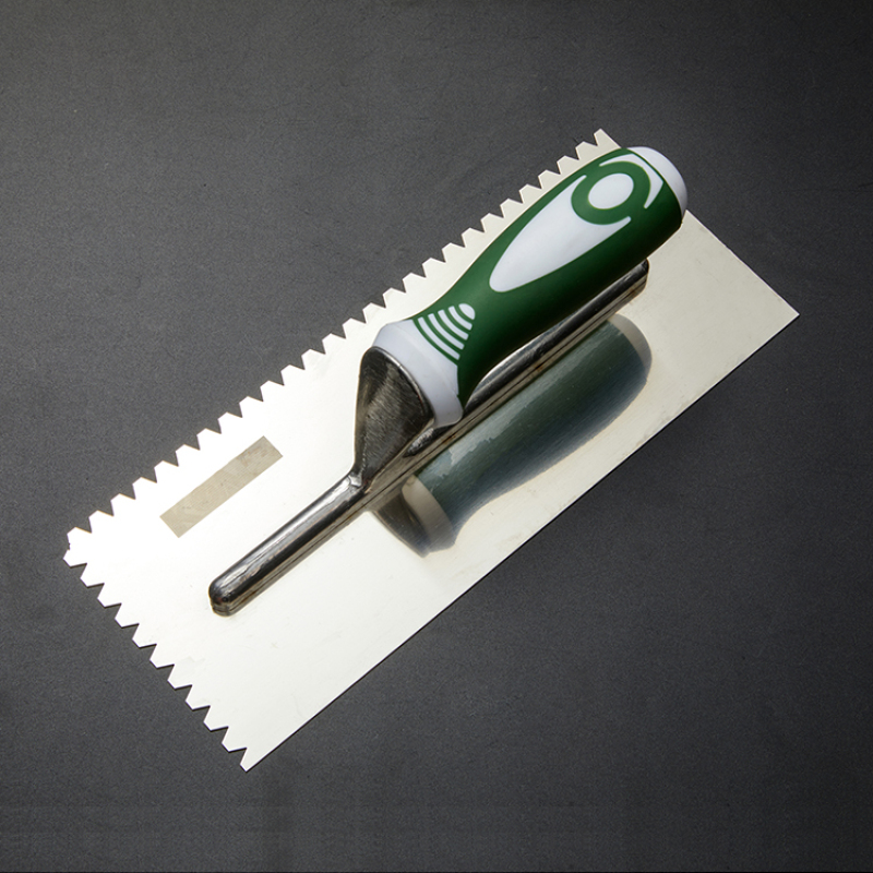 Truelle de finition en acier au carbone de 0.7 mm Truelle de plâtre de lame en acier inoxydable de forme rectangulaire dentée 1x1cm