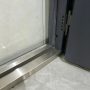 Modern Steel Pivot Front Door with Frosted Glass Sidelights for Luxury Villa Exterior
