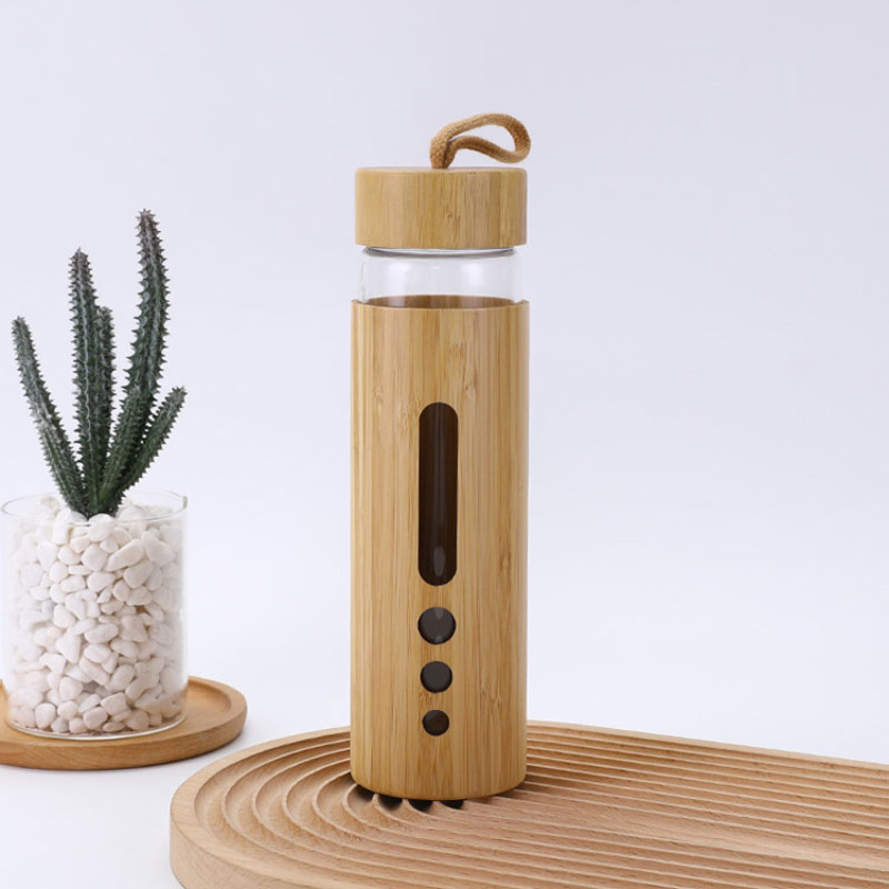 New Creative 550ml Premium Eco-friendly Bamboo Shell Crystal High Boro silicate Glass Water Bottle With Bamboo Sleeve Rope Handle