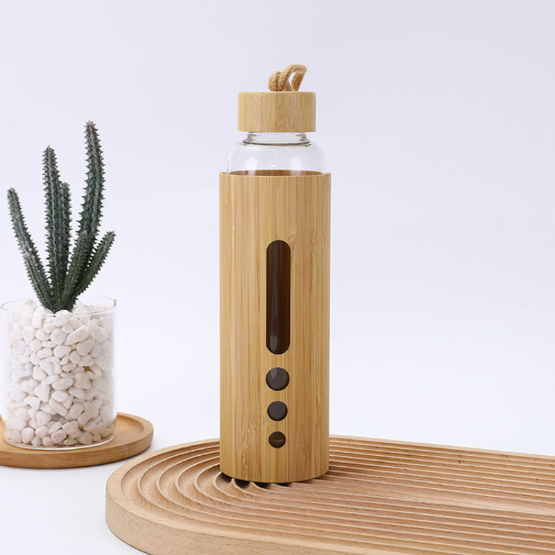 New Creative 550ml Premium Eco-friendly Bamboo Shell Crystal High Boro silicate Glass Water Bottle With Bamboo Sleeve Rope Handle