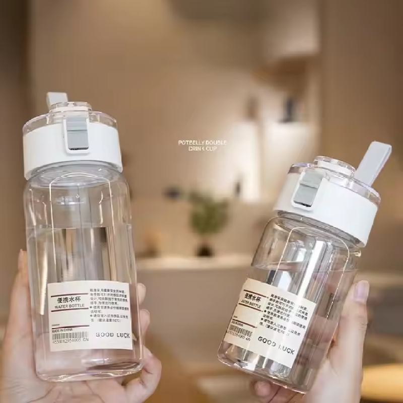 Wholesale Novelty INS Water Cup PortableTravel Clear Plastic Water Bottle With Grip Bouncing Cover Lid