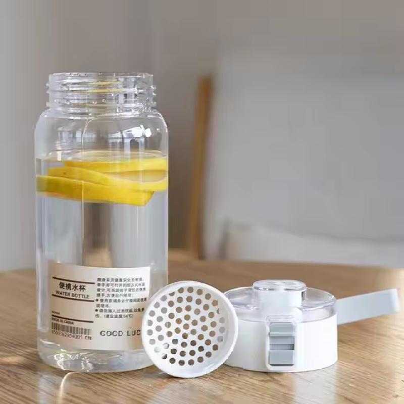 Wholesale Novelty INS Water Cup PortableTravel Clear Plastic Water Bottle With Grip Bouncing Cover Lid