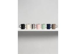 Which color finishes are currently trending for stainless steel coffee mugs in North America?