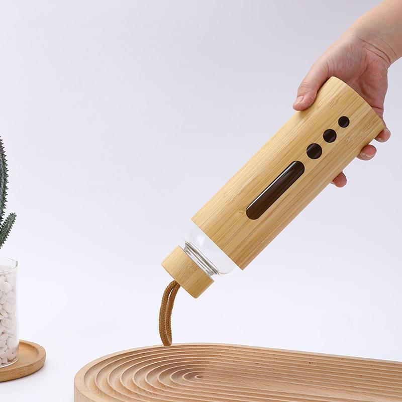 Customized Bamboo Shell Single Wall High Borosilicate Glass Water Bottle with Carrying Handle and Lid