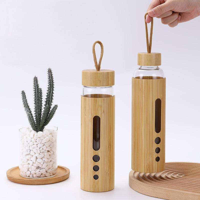Customized Bamboo Shell Single Wall High Borosilicate Glass Water Bottle with Carrying Handle and Lid