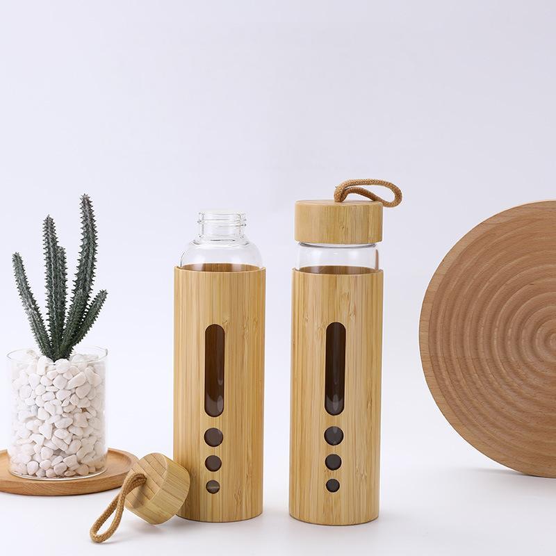 Customized Bamboo Shell Single Wall High Borosilicate Glass Water Bottle with Carrying Handle and Lid