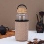 Customized Large Capacity High Borosilicate Single Wall Glass Water Bottle with Bamboo Lid for Outdoor Use