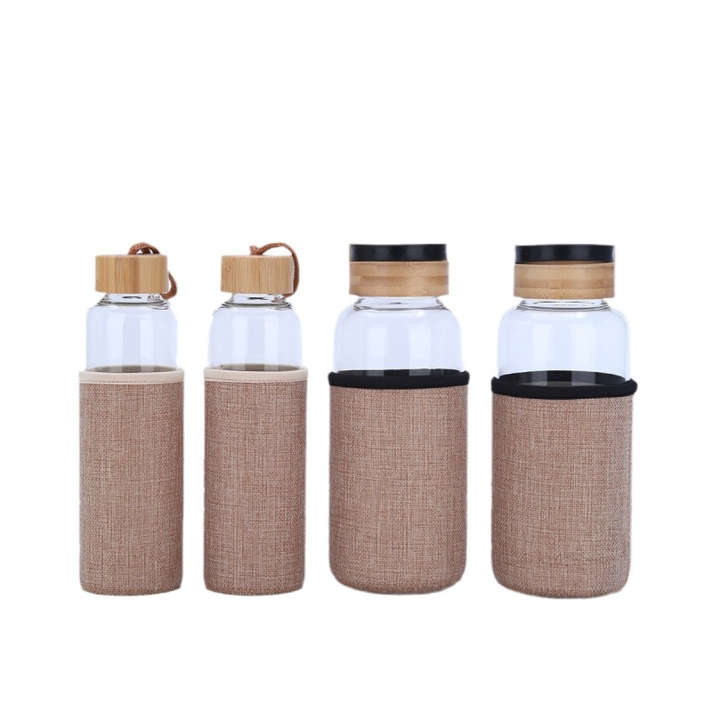 Customized Large Capacity High Borosilicate Single Wall Glass Water Bottle with Bamboo Lid for Outdoor Use
