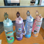 Coocodrink Cartoon Summer Astronaut Coated Water Bottle for Children Portable Strap with Bouncing Lid Straw Direct Drinking PC Plastic Cup
