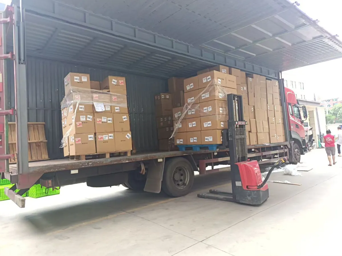 Truck loaded with packed drinkware cartons for shipment