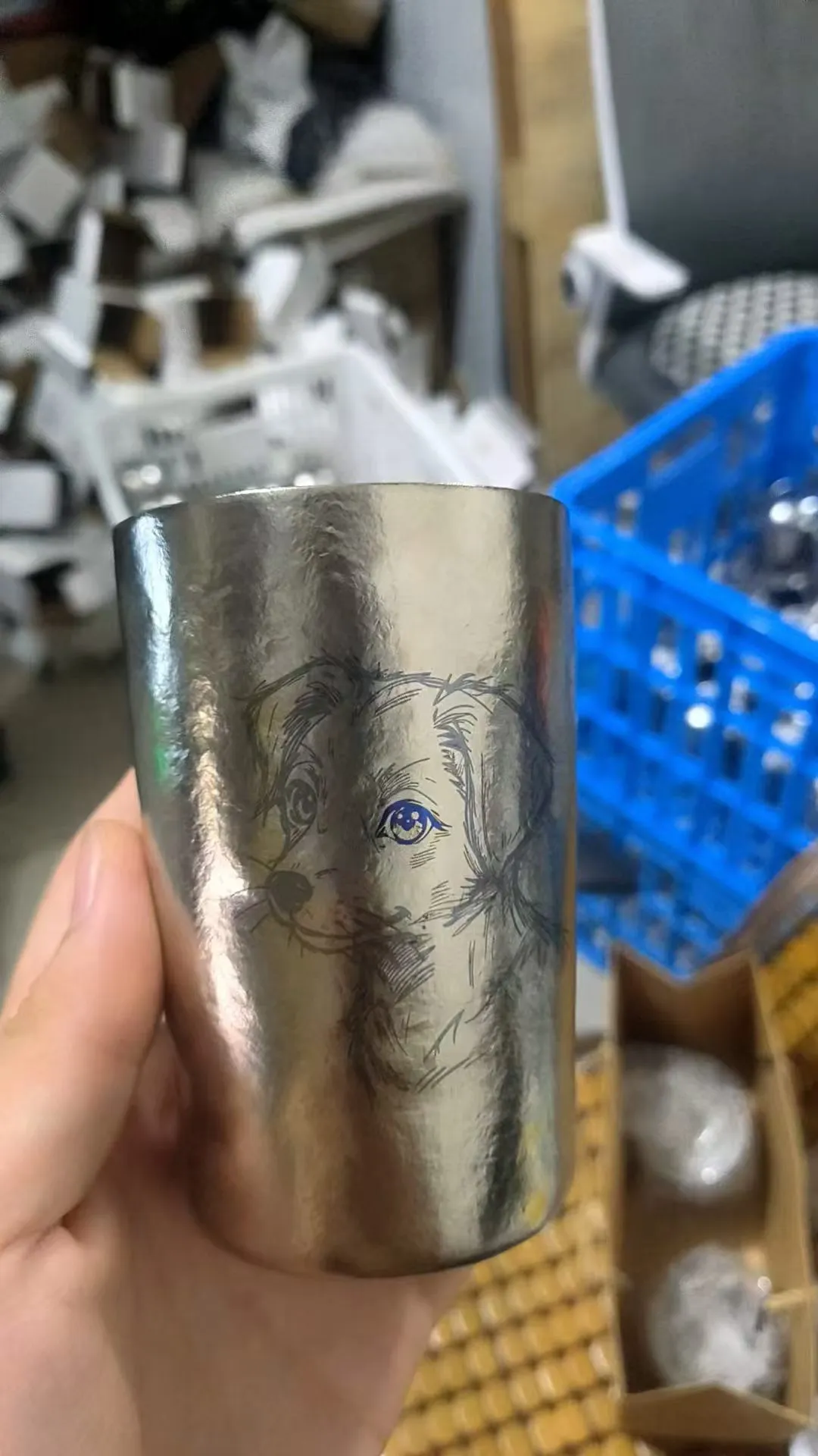 Fine-line rotary laser marking on the curved surface of a titanium cup