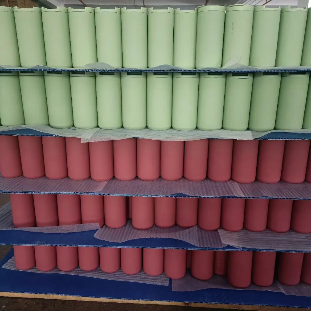 Tumbler bodies arranged by green, pink, and blue color batches