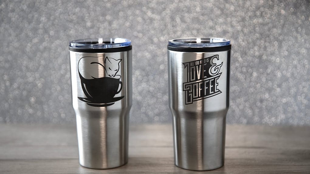 finished bulk stainless steel tumblers featuring sharp, high contrast laser engraved logos ready for corporate gifting