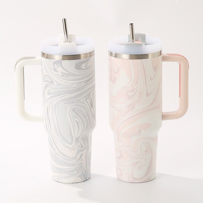 elegant white marble texture hydro dipped design on bulk stainless steel tumblers for luxury gifts