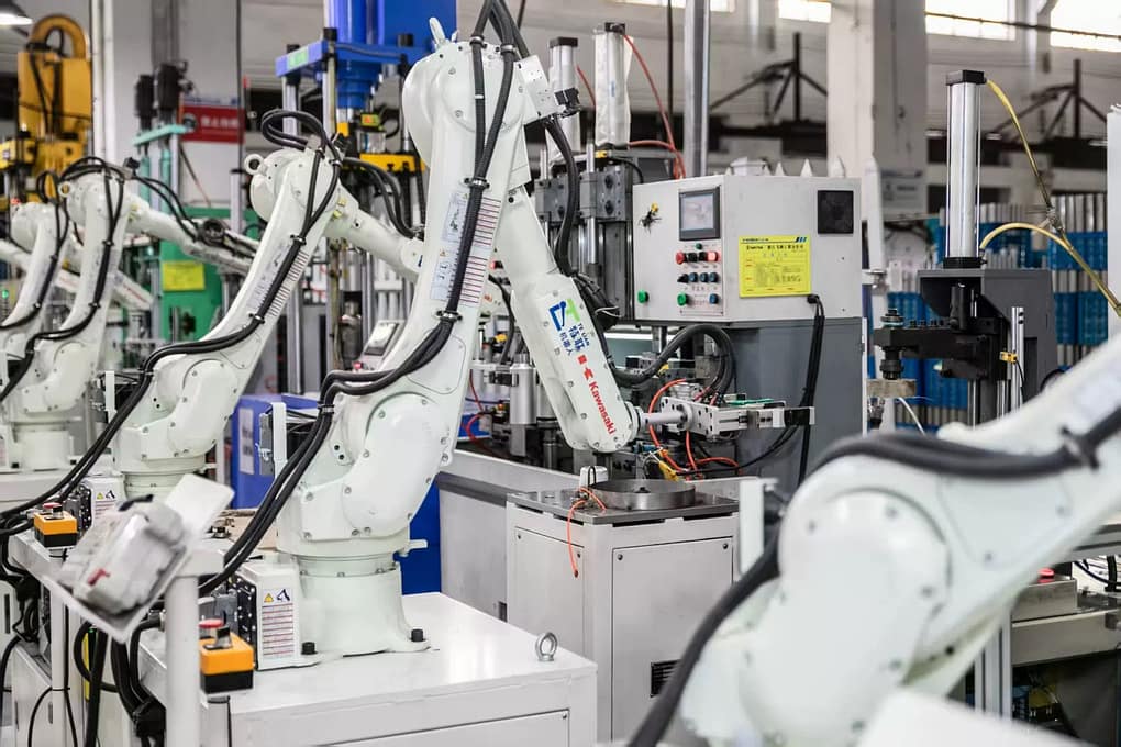 automated hot stamping machine processing tumblers in bulk, ensuring precise temperature control and foil adhesion for custom stainless steel cups