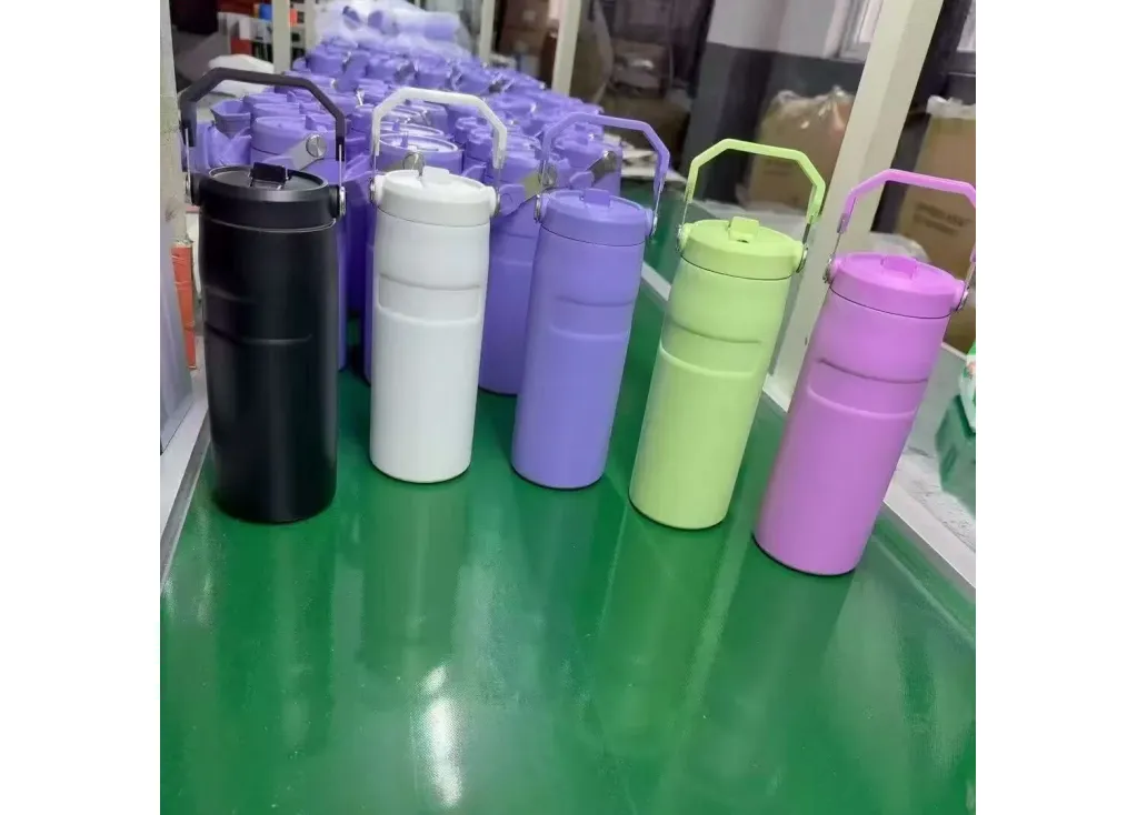 Finished handled drinkware samples in black white purple green and pink