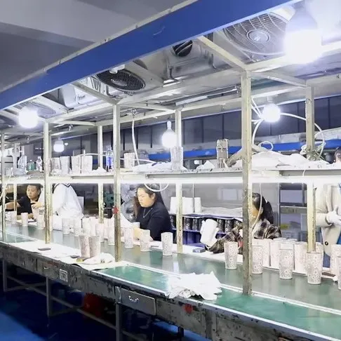 Custom drinkware assembly line with multiple production workstations