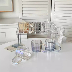 Glass cup with big ears and bubble handle