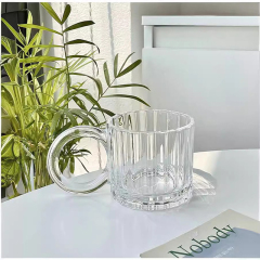 Glass cup with big ears and bubble handle