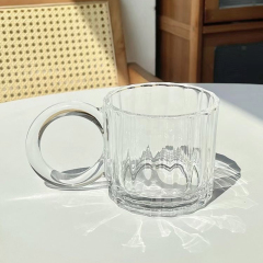 Glass cup with big ears and bubble handle