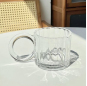 Glass cup with big ears and bubble handle