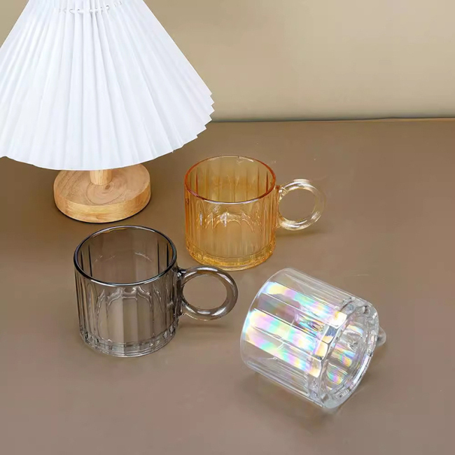Glass cup with big ears and bubble handle