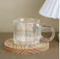 Glass cup with big ears and bubble handle