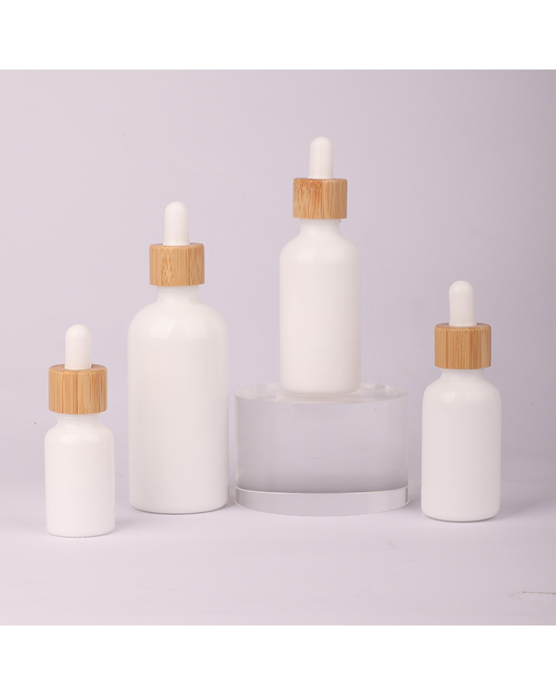 wholesale price Factory Stock 10ml 15ml 30ml 50ml 100ml Bamboo Cap Round Glass Essential Oil Dropper Bottle
