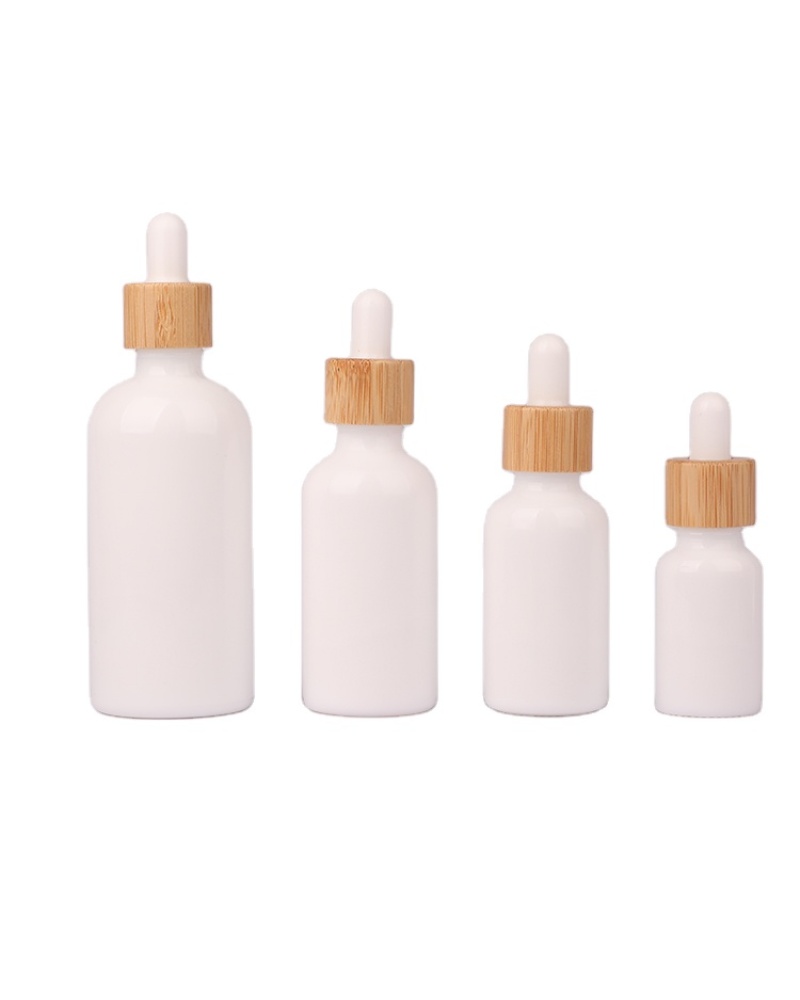 wholesale price Factory Stock 10ml 15ml 30ml 50ml 100ml Bamboo Cap Round Glass Essential Oil Dropper Bottle