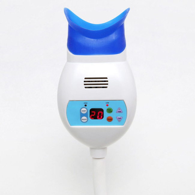 La luz blanqueadora de dientes de Led azul se conecta a la silla dental