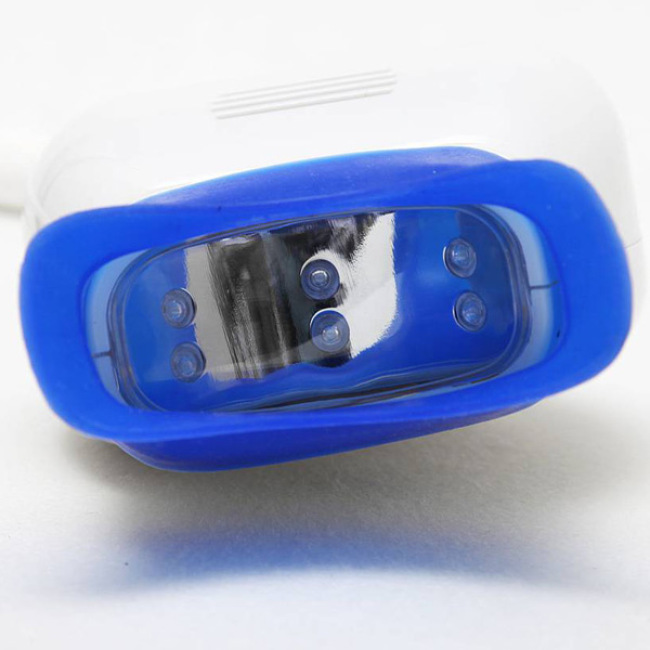 La luz blanqueadora de dientes de Led azul se conecta a la silla dental