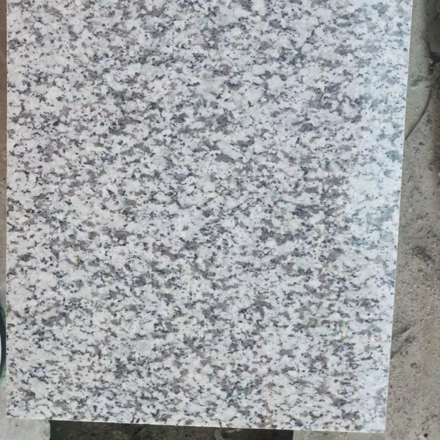 carreaux de granit blanc noisette poli