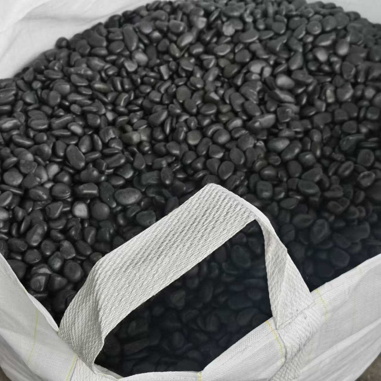 black pebble stone pathway