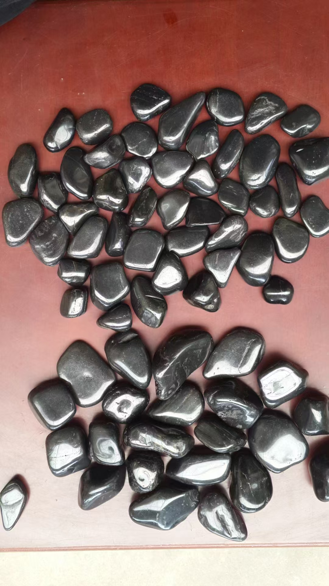 polished black pebble stone