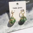 Green conch earring