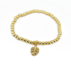 BC1389  tiny 4mm gold accent ball beaded stretch bracelet with cz paved dollar money sign symbol bear leaf heart charm