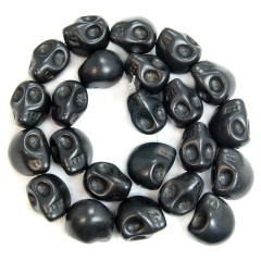 TB0051 Howlite Carved Turquoise Skull Beads