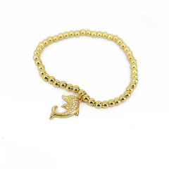 BC1389  tiny 4mm gold accent ball beaded stretch bracelet with cz paved dollar money sign symbol bear leaf heart charm