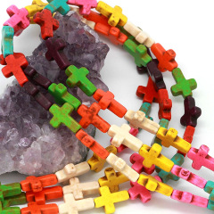 TB0268 Tiny multicolor howlite turquoise cross beads