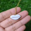White lip necklace