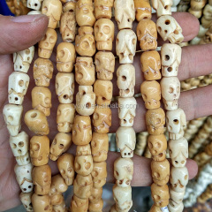 OB077 Tiny hand carved Ox Bone Skull ghost beads, bone skeleton beads