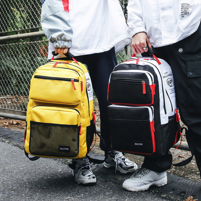 Students' backpacks fashion trend large capacity schoolbag college students' leisure male junior high school students' schoolbag students' Backpack