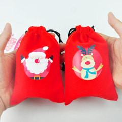 Paquete rojo creativo bolsillo patrón navideño decoración franela regalo bolsa con cordón bolsa de almacenamiento de regalo de Navidad en stock