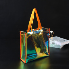 La bolsa de regalo con publicidad láser de PVC modificó el logotipo personalizado de la bolsa de cosméticos de plástico transparente de colores